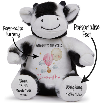 Black and white cow plush toy with personalized text on a white background STOCK-COW