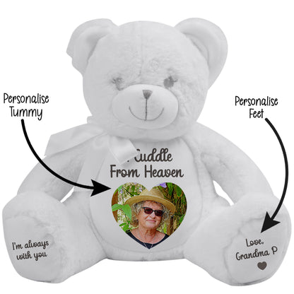 White teddy bear with a heart-shaped photo  and personalied cuddle from heaven text text on a white background CFHWBE