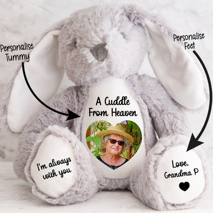 Gray stuffed bunny with customisable cuddle from heaven text and a heart shaped photo on a light background. CFHGBU