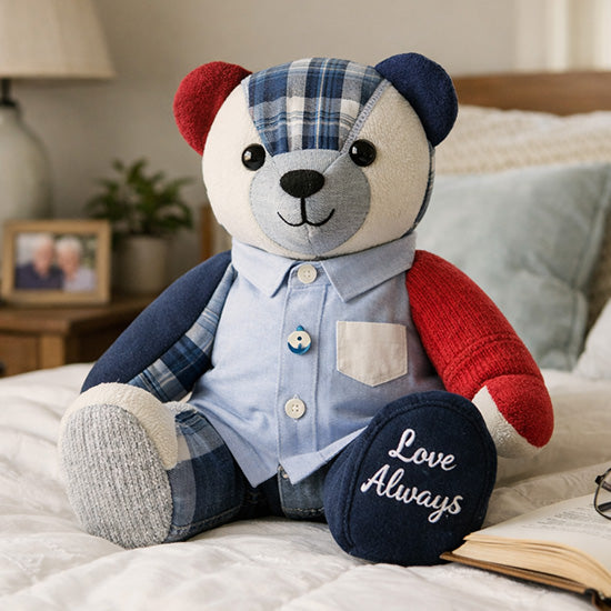 Teddy bear wearing a shirt with love always on a foot