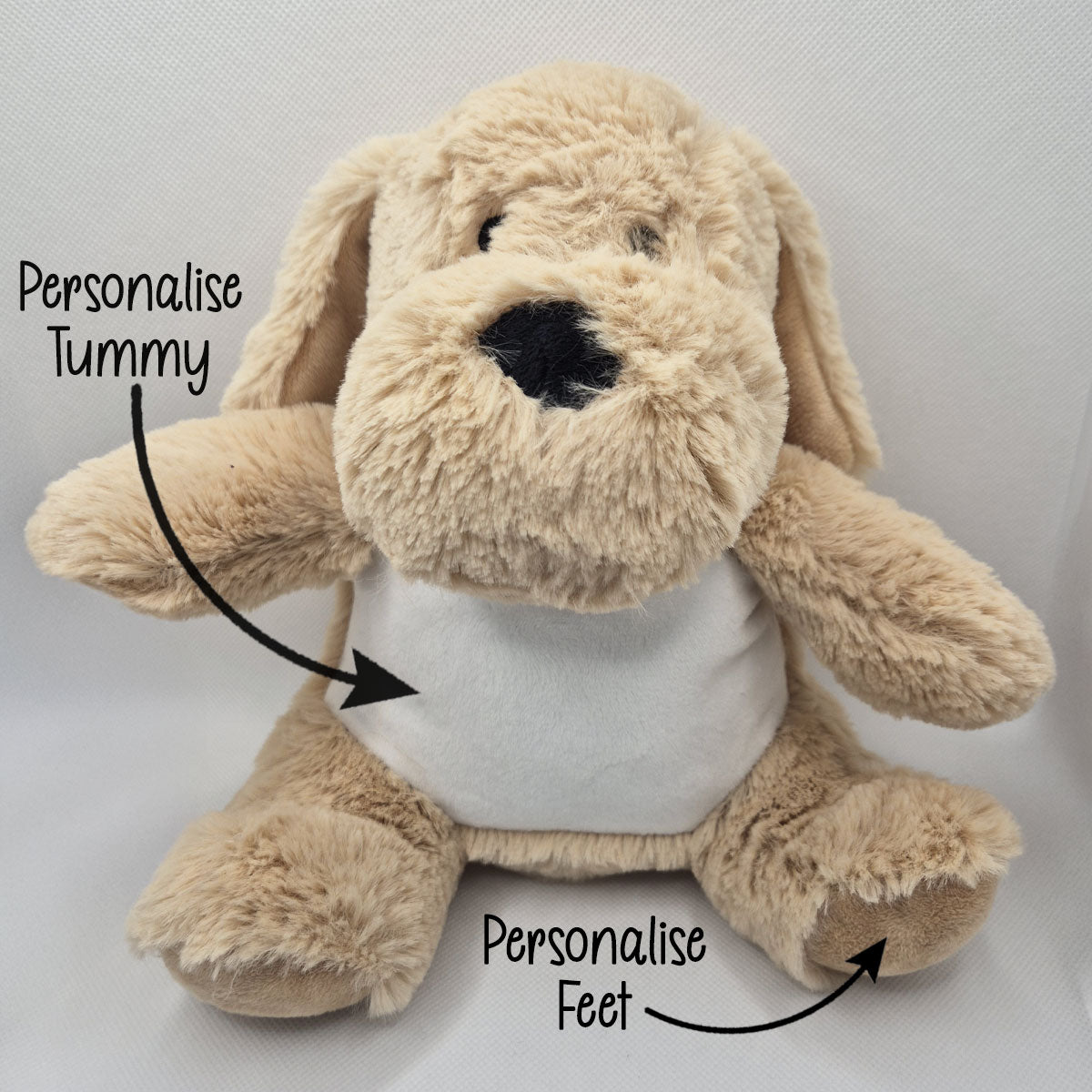 Brown stuffed dog teddy with text indicating areas to personalise on a white background