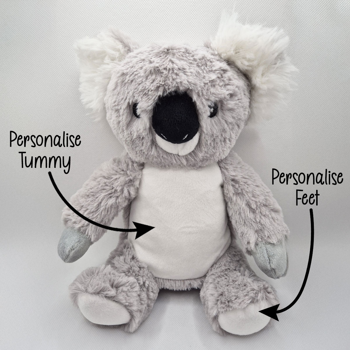 Plush koala teddy with text indicating areas to personalise on a white background