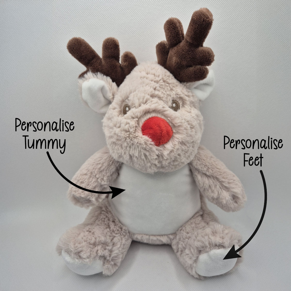 Plush reindeer teddy with text indicating areas to personalise on a light grey background